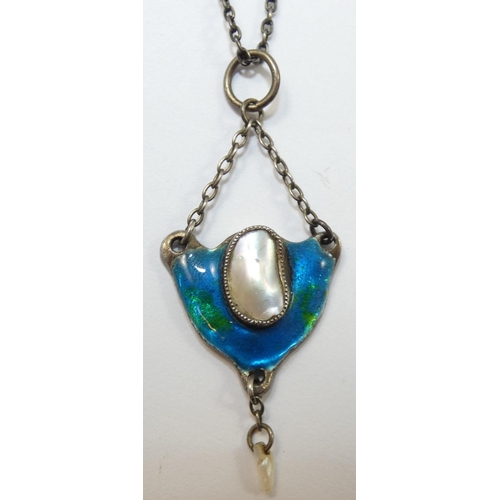 130 - A Continental silver, enamel and blister pearl pendant, unmarked, c. 1905, with pearl drop below, 2.... 