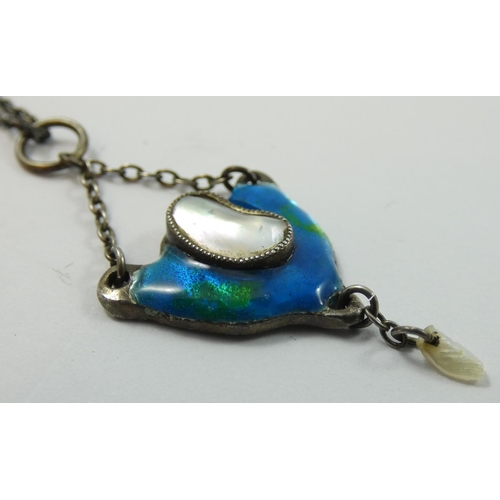 130 - A Continental silver, enamel and blister pearl pendant, unmarked, c. 1905, with pearl drop below, 2.... 