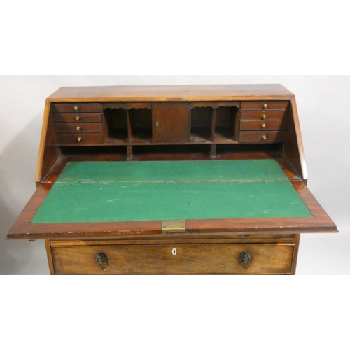 473 - A 19th century mahogany fall front bureau, opening to reveal a fitted interior, over four graduated ... 