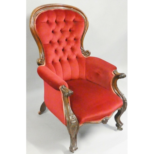 480 - A Victorian mahogany parlour chair, with carved scroll arms and legs, button back upholstery, 109 cm... 