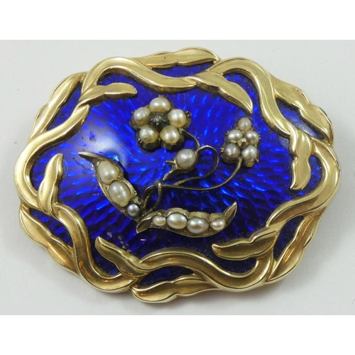 121 - A Victorian gold, blue enamel and pearl mourning brooch, the forget me knot motif applied to a guill... 