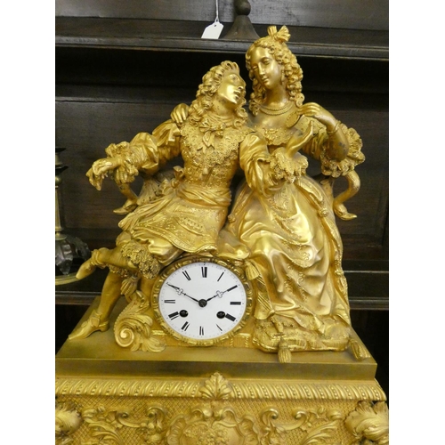 428 - Richond, Paris, a 19th century French ormolu mantel clock, the white enamel dial with Roman numerals... 