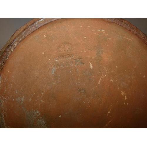 327 - An unusual Bretby art pottery stoneware jardinière, with scalloped rim, decorated with trees moulded... 