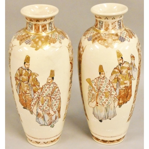 359 - A Japanese large pair of Satsuma Meiji period vases, decorated with two dignitaries to one panel and... 