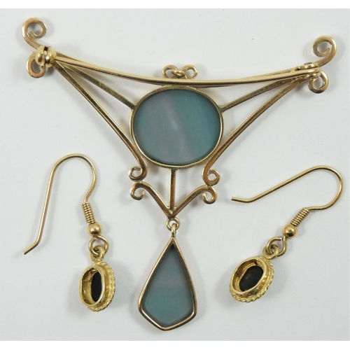 138 - A 9ct gold and opal doublet brooch, collet set with a circular stone in an openwork mount, drop belo... 