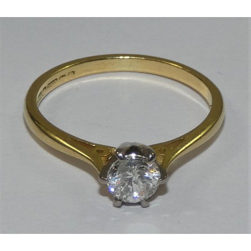 132 - An 18ct gold single stone diamond ring, claw set with a brilliant cut stone, estimated to weigh 0.45... 