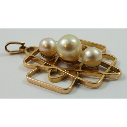 142 - A 9ct gold and pearl pendant, the graduated cultured pearls set in an abstract design, 7.5 gms.