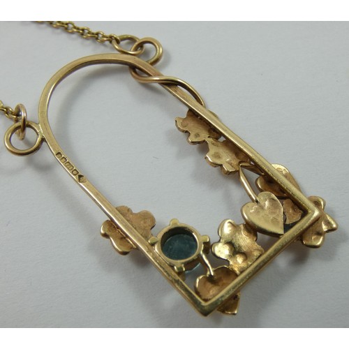 143 - A 9ct gold and blue zircon pendant, in a floral mount, a similar bangle and pair of ear rings, gross... 