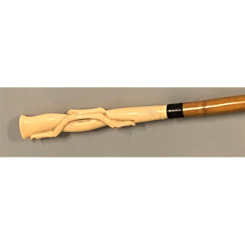 235A - An early 20th century ivory topped bamboo cane, the handle carved and initialled M.P.R., length 88 c... 