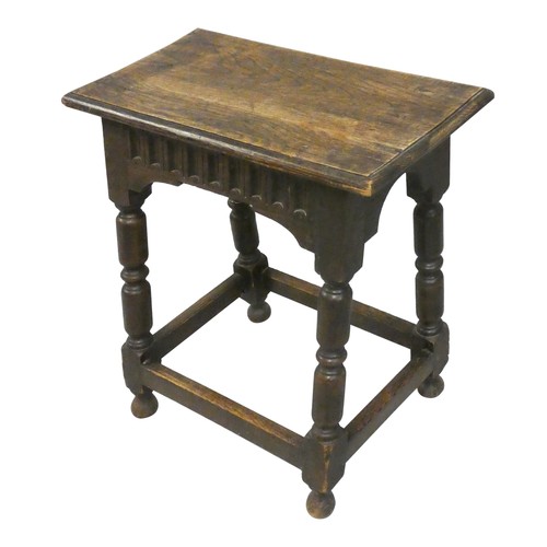 479 - An Edwardian oak joint stool, with carved frieze and turned legs, 53 x 27 x 54 cm.