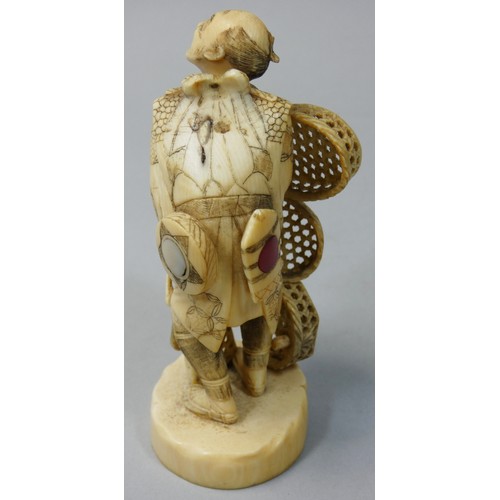 361 - A Japanese Meiji Period Ivory Okimono, by Toshimasa, in the form of a street vendor carrying baskets... 