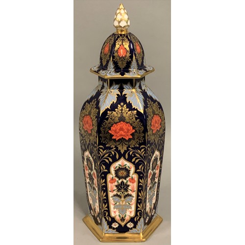 318 - A large Hamilton Imari octagonal temple vase and cover, T.Goode & Co. Ltd, retailers mark, 45cm high... 