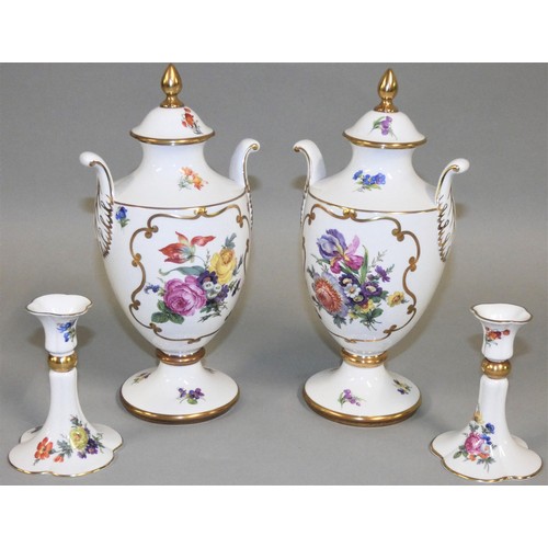 316 - A pair of Caverswall bone china lidded urns, with floral decoration, 26 cm, together with a matching... 