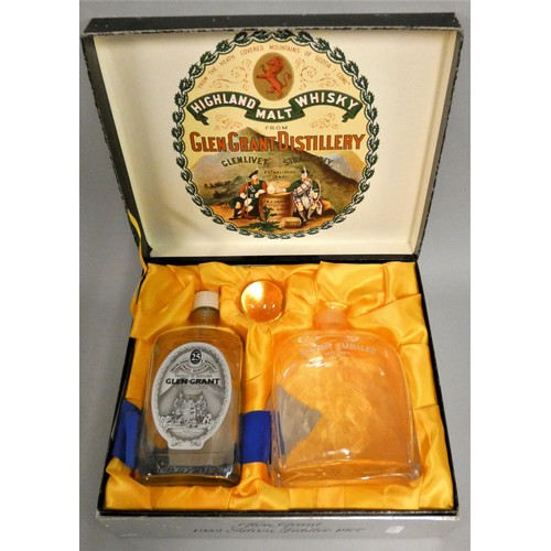 288 - Glen Grant 25 year old Silver Jubilee presentation case including, a glass decanter  and a Glen Gran... 