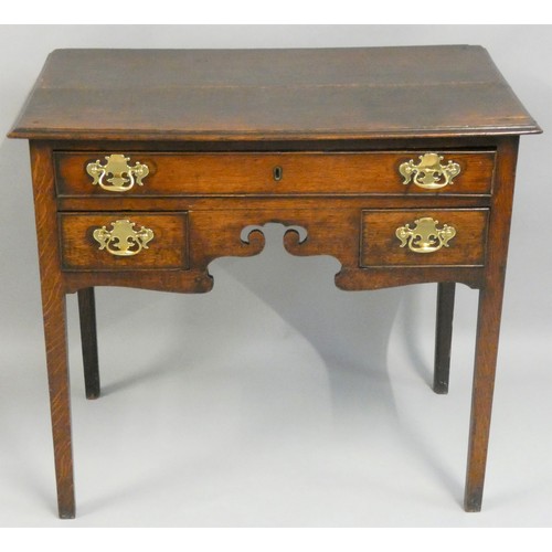 491 - A 19th century oak lowboy, the rectangular top with a moulded edge, fitted with a single long and tw... 