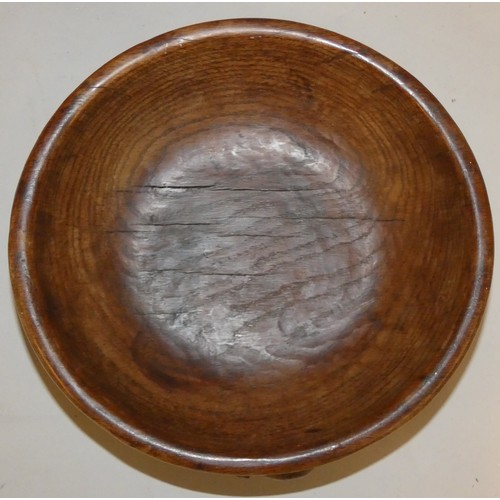 250 - Robert Mouseman Thompson (1876-1955), an oak circular fruit bowl, probably pre war, adzed exterior a... 