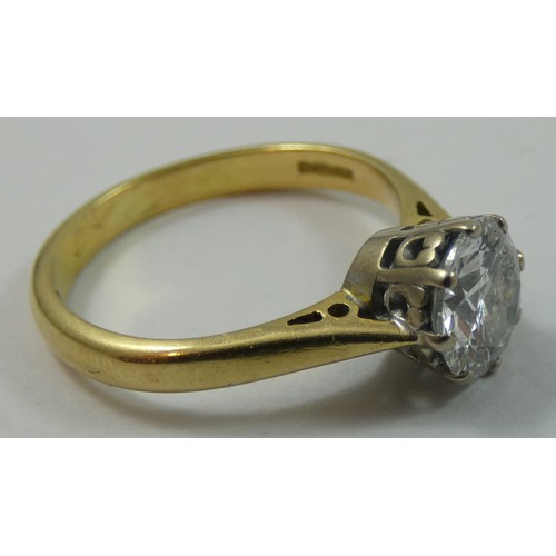 91 - A single stone diamond ring, claw set with a brilliant cut stone, calculated to weigh 1.20 cts, colo... 