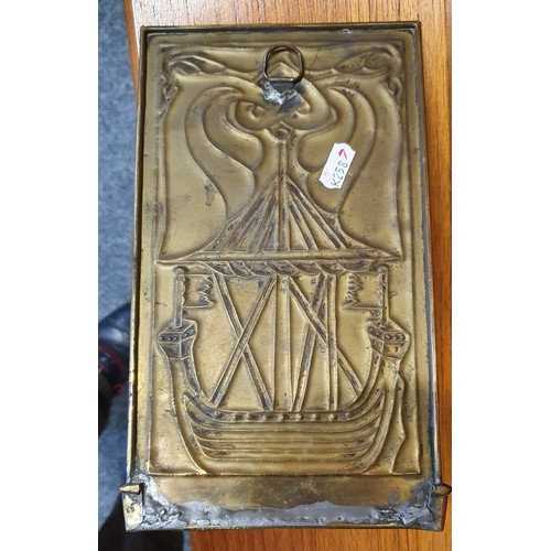 205 - Margaret Gilmour (attributed), a Glasgow School, Arts and Crafts brass wall sconce, repousse decorat... 