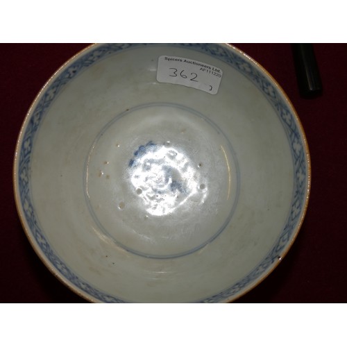 362 - A pair of Chinese Qing dynasty porcelain bowls, with blue borders, the brown glaze exterior with pan... 