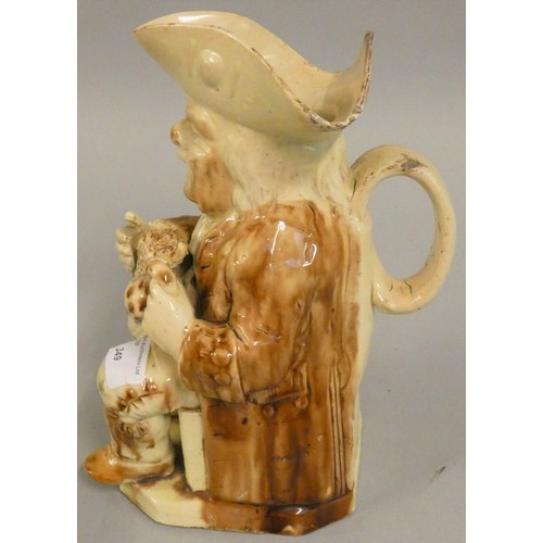 349 - An 18th century pearlware Toby jug of so-called 'step' or 'Twyford' type, circa 1780, modelled seate... 