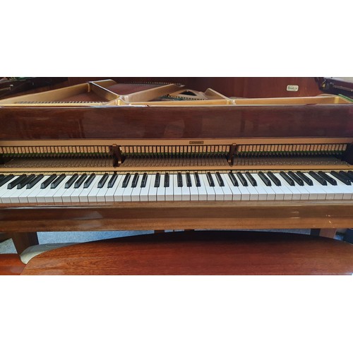 502 - A Kemble baby grand piano in a mahogany case, retailed by Harrods, reference number 69981, c.1979, w... 