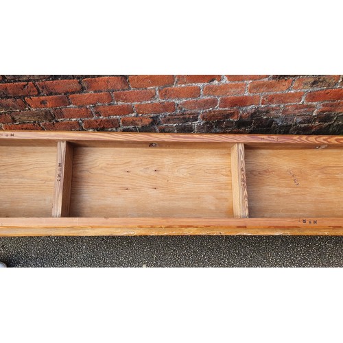 155 - A Highland Railway (HR) pitch pine waiting room bench, raised on turned legs, branded multiple times... 