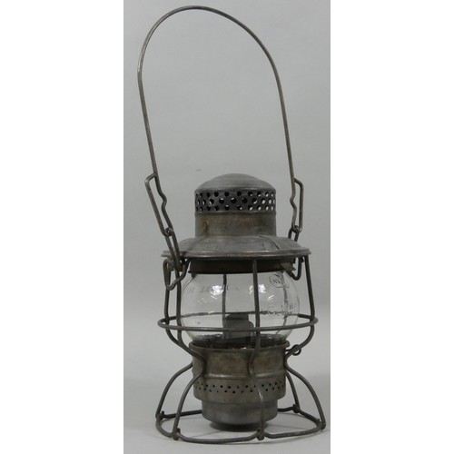 248 - A Canadian National Railway storm lantern, with burner and glass shade, embossed CNR, (handle raised... 