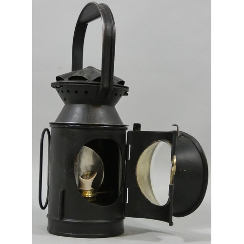 255 - A SR (Eastleigh) four aspect black painted lamp, stamped SER, with glasses and burner.