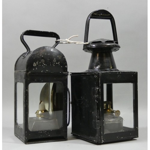 242 - A BR hand lantern with embossed double arrow motif, 33 cm, together with another hand lantern with L... 