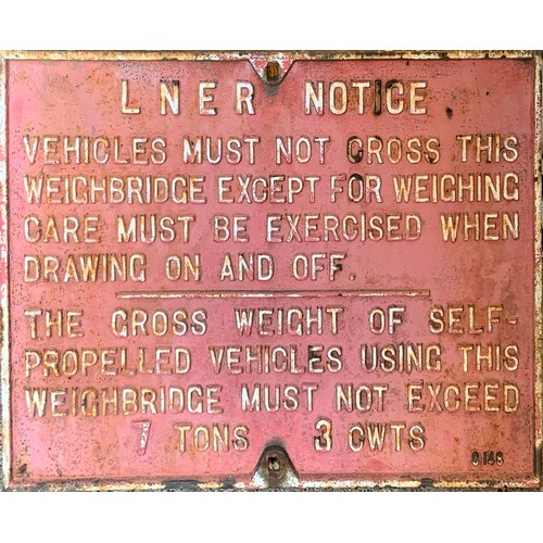 299 - A LNER cast iron sign, Vehicles must not cross Weighbridge, (eight lines of text), 48 x 69 cm.