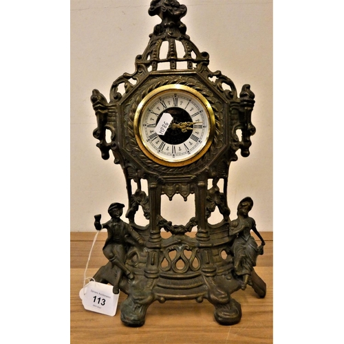 113 - A West German ornate brass mantle clock, 36 cm.