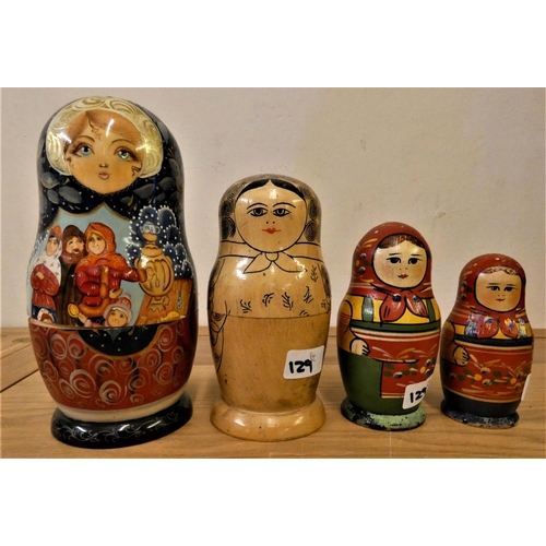 129 - A Russian set of four dolls, 22 to 13 cm.