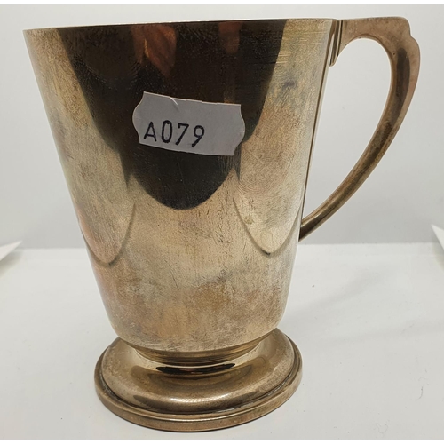 149 - A silver half pint mug, London 1935, uninscribed, 7 oz.