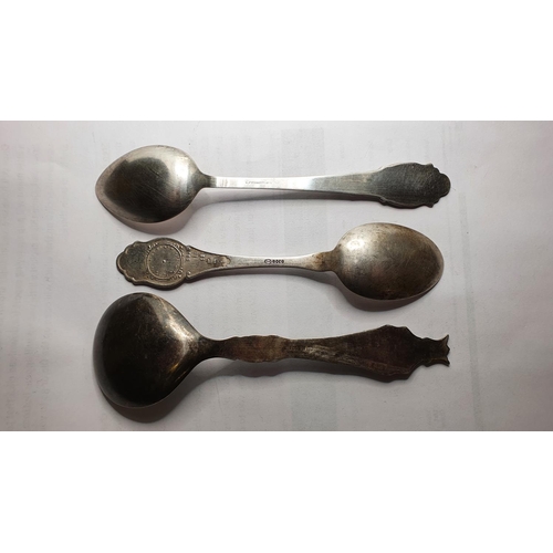 157 - A Hans Hansen Norwegian decorative spoon and two other spoons.