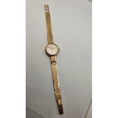 162 - Rolex, a 9ct gold manual wind ladies wristwatch, with integral bracelet, 20 gms, case.