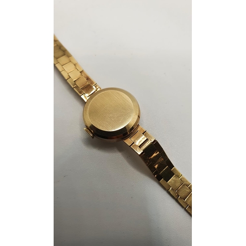 162 - Rolex, a 9ct gold manual wind ladies wristwatch, with integral bracelet, 20 gms, case.