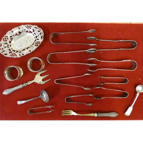 169 - An 830 standard silver cast silver pin dish, a silver sugar sifter spoon, Sheffield 1901, and other ... 