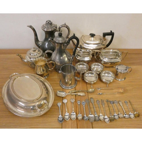 175 - A three piece electroplated tea service, a set of four slats and other plated wares.