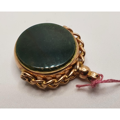 189A - A 9ct rose gold swivel seal, Chester 1920, set with bloodstone and cornelian, diameter 22mm.