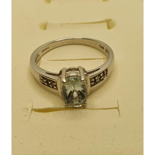 190D - A 9ct white gold aquamarine and diamond ring, one setting vacant, 2 gms, size L 1/2.