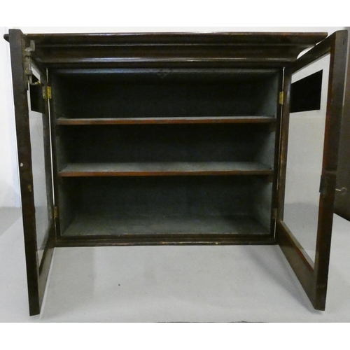 201 - A mahogany glazed two shelf cabinet, with Liberty & Co., London applied decal, 67 x 88 x 26 cm.