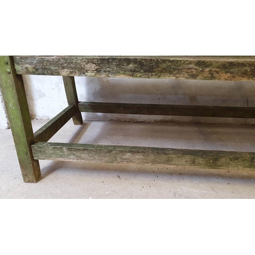 3 - A hardwood garden bench with scroll arms, 197 cm and another bench, (one leg shorter)