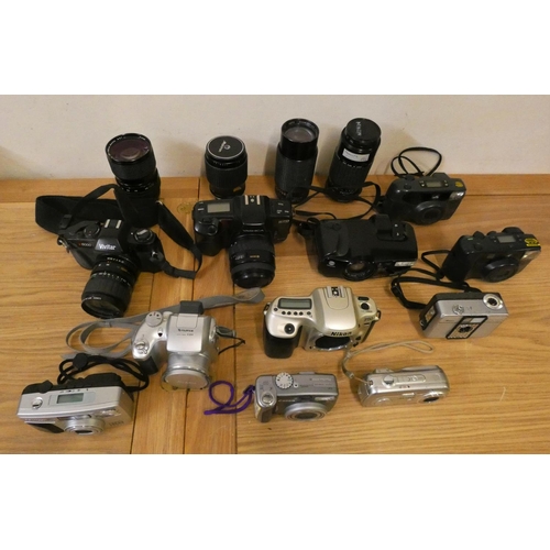 61 - A collection of camera's and lens, to include Olympus, Nikon and Yashica (2).