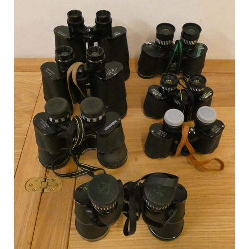 62 - Seven pairs of cased binoculars, to include Migon, Chinon and Ajax.