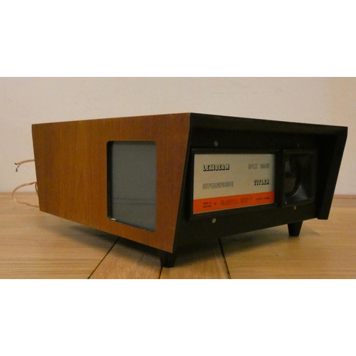 67 - An Eumig 820 Sonomatic sound projector, a Prinzmatic slide projector, a Paximat Triumph slide projec... 