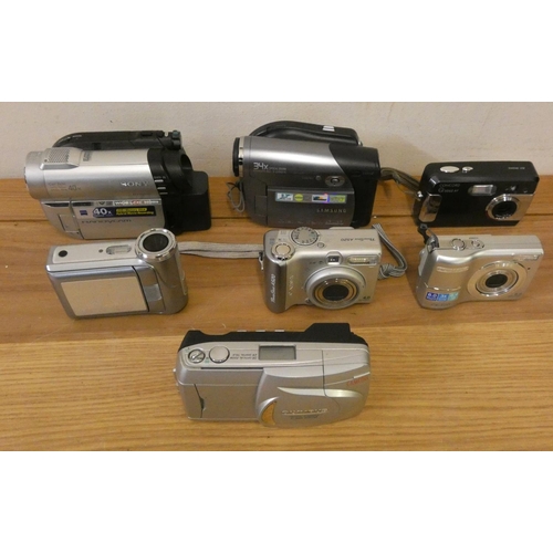 79 - A quantity of SLR camera's, to include Canon EOS 3000, Zenit EM, Praktica MTL3 and others (2).