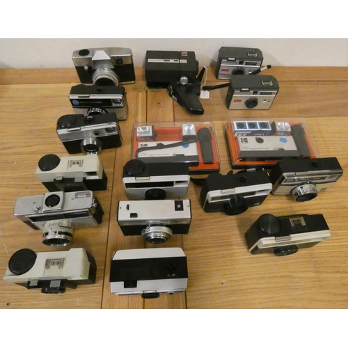 87 - A Pacemaker cine camera, a Bell & Howell turret, three camcorders and various instamatic camera's.