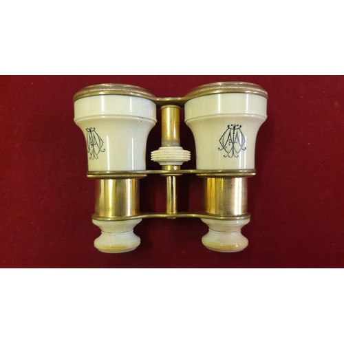 97A - A Victorian pair of ivory and brass Opera glasses, un-named, monogrammed, another pair (one side cra... 