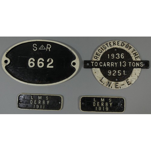 212 - A round cast iron LNE (E) 1936 wagon plate, an oval SR 662 carriage plate and two LMS identification... 