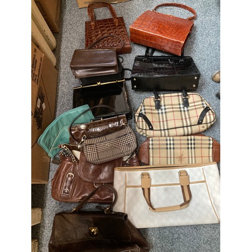 205 - A collection of handbags, including one marked Gucci (2).